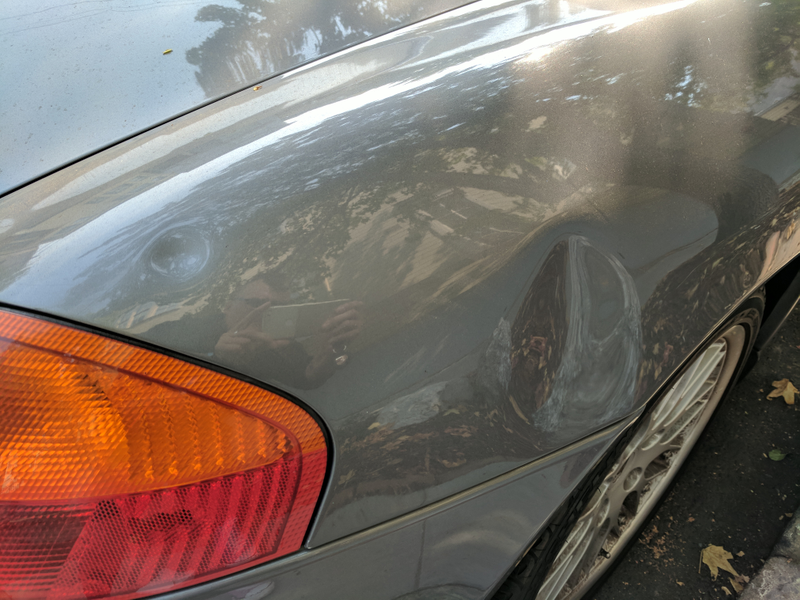 Illustration for article titled Stumbling Asshole Caught On Video Denting A Street-Parked Porsche
